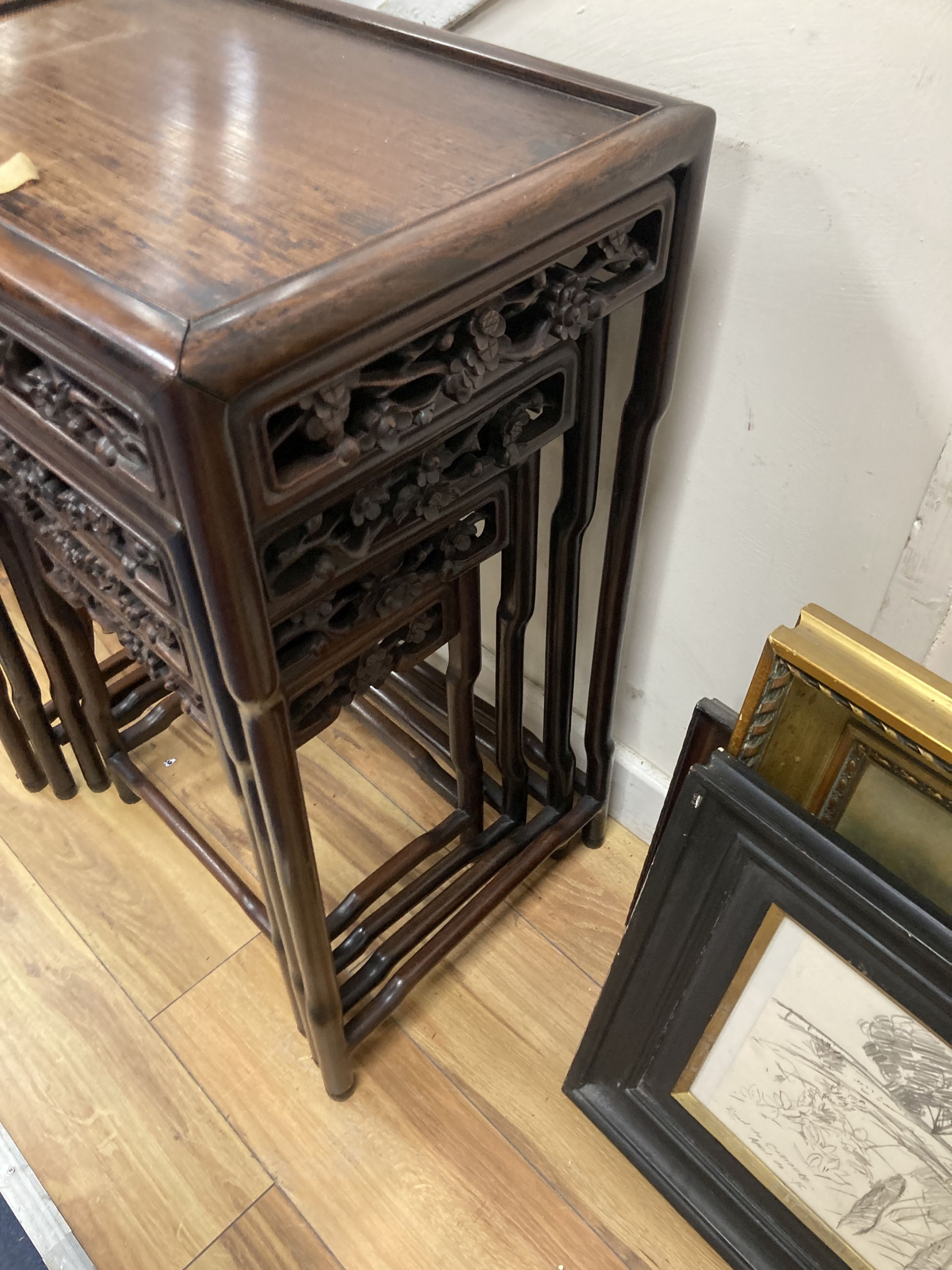 A Chinese nest of four hongmu tables, width 50cm depth 36cm height 72cm